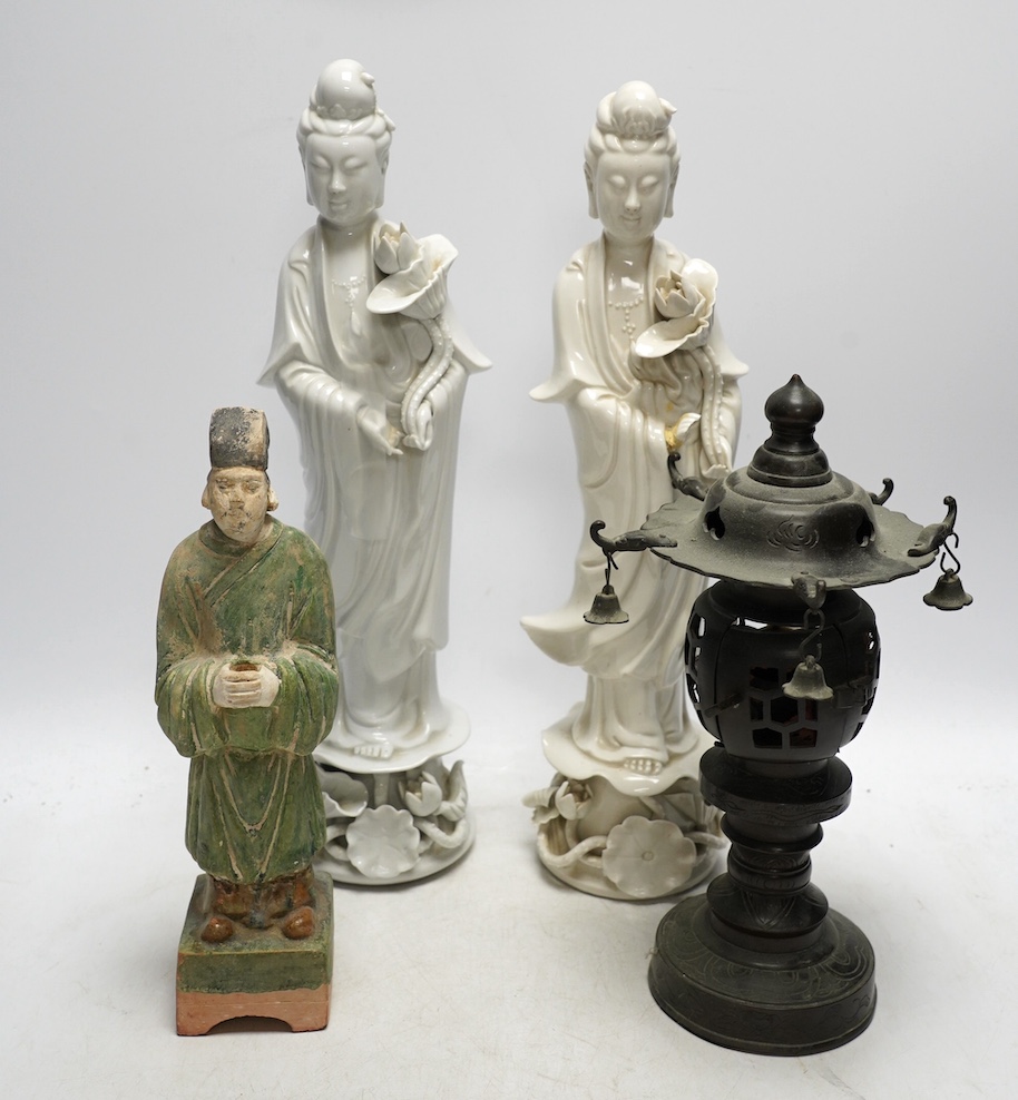 Two Chinese blanc de chine figures, a pottery figure and a metal incense burner, tallest item 35.5cm high. Condition - poor to fair